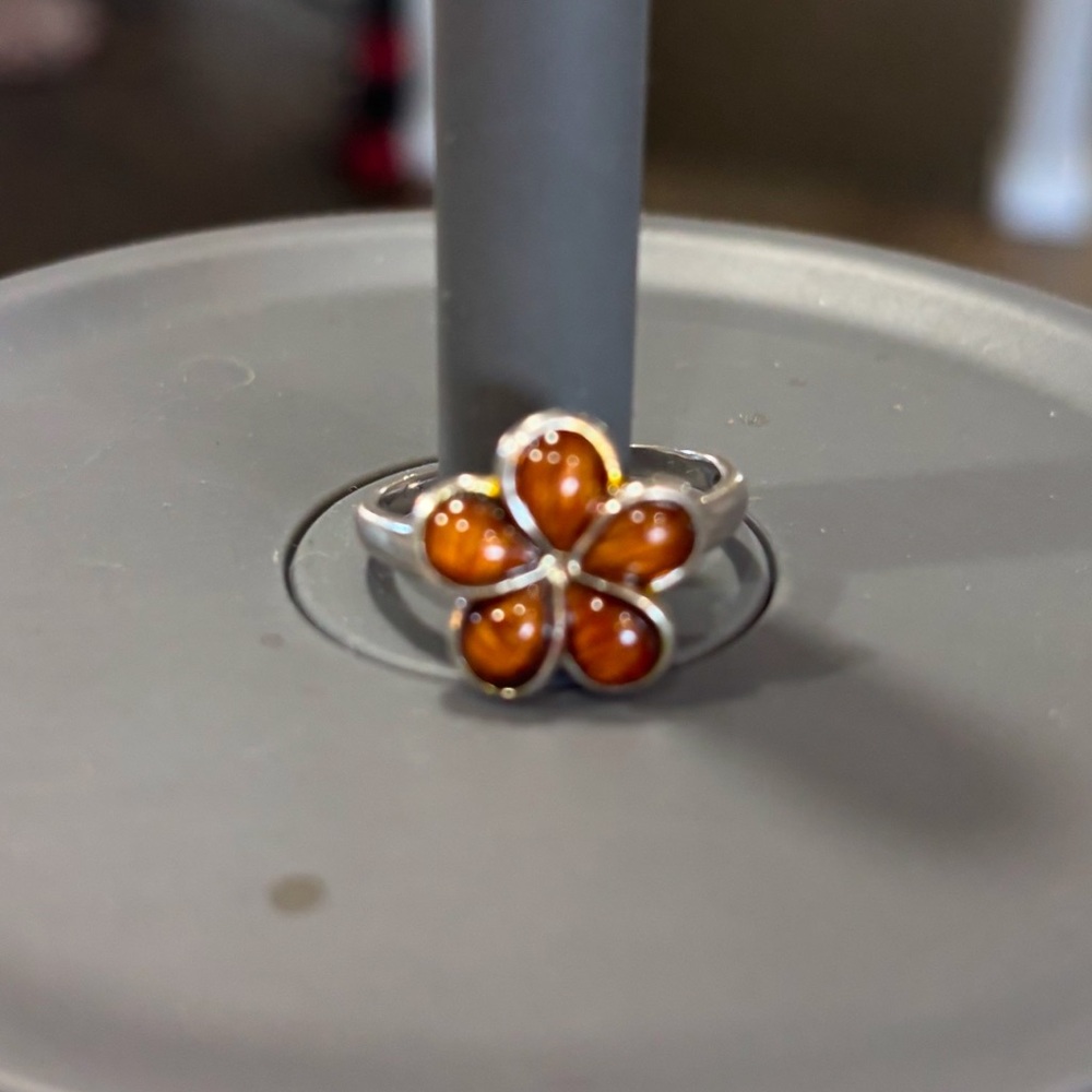 Koa wood flower ring set in sterling silver. Size 8
